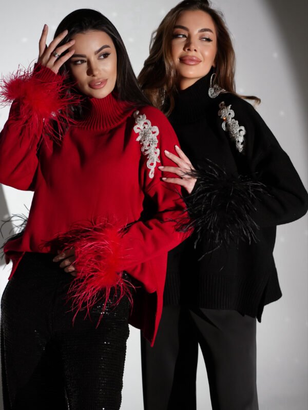 Shine sweater with decor and boa